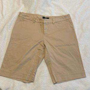 Tan Mossimo shorts with pockets size 10. Great shape.